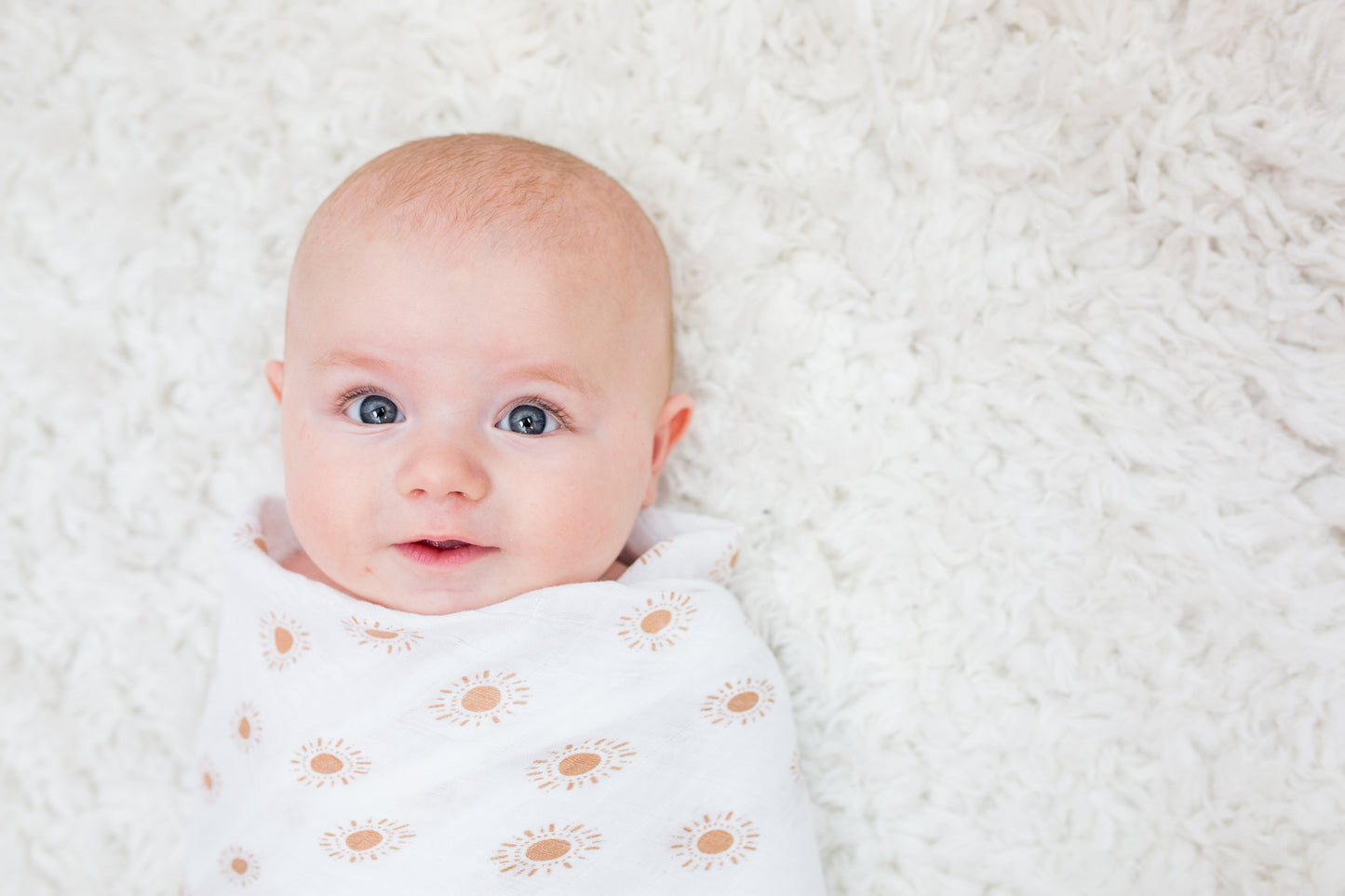 Lulujo - Muslin Swaddle - Suns (100cm x 100cm)